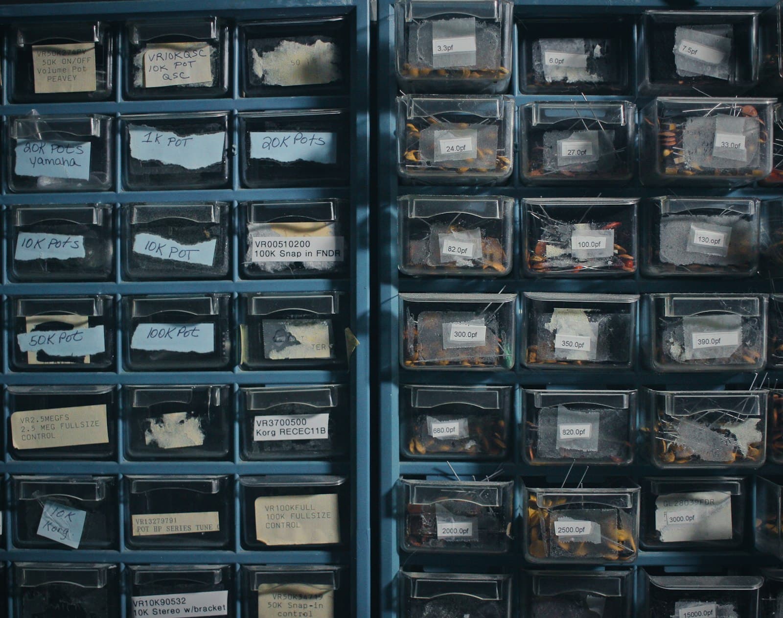 Labelled storage bins holding electronic components